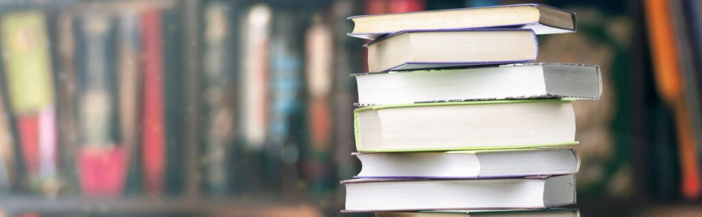 Was ist eine Normseite Buecherstapel